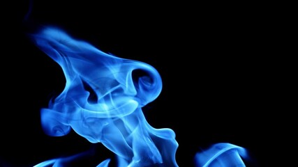 Wall Mural - video with blue flame isolated on black background. Fire bright sparks slow motion