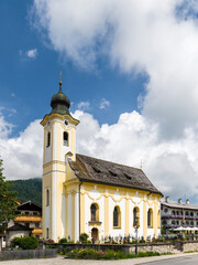 Canvas Print - Church Sankt Remigius. Village Schleching in the Chiemgau in the Bavarian alps. Europe, Germany, Bavaria