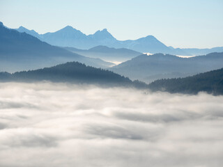 Poster - View from Mount Hoernle over a sea of fog hiding the valley of river Ammer towards Fuessen. Bavarian alps near Unterammergau in the Werdenfelser Land (Werdenfels county). Europe, Germany, Bavaria