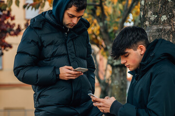 Poster - young people with mobile phone on the street