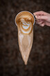 Coffee latte art Prepared and poured out by a barista