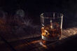 a glass of wiskey on the rocks in the smoke on a wooden table
