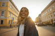 © Look! - Outdoor lifestyle of cheerful young caucasian woman on street makes self-portrait to camera. Tanned blonde model laughs out loud. Real emotions concept.