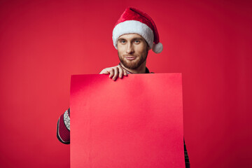 Wall Mural - emotional man in a christmas red mockup poster isolated background