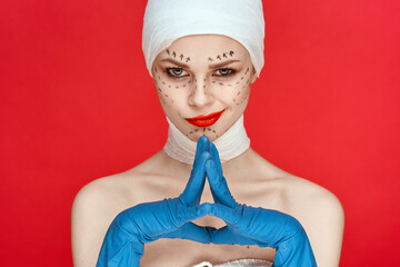 Wall Mural - woman Red lips plastic surgery operation bare shoulders red background