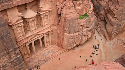 Wall Mural - View from above, stunning view of Al-Khazneh (The Treasury) one of the most elaborate temples in Petra, a city of the Nabatean Kingdom, Jordan.