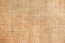Natural Sackcloth Textured For Background.Jute Hessian Sackcloth Canvas Sack Cloth Woven Texture Pattern Background In Beige Cream Brown Color.Empty Space.