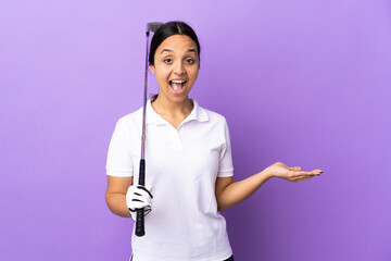 Wall Mural - Young golfer woman over isolated colorful background with shocked facial expression