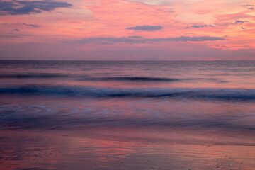 Sticker - USA, Georgia, Tybee Island. Colorful pink sunrise at Tybee Beach.