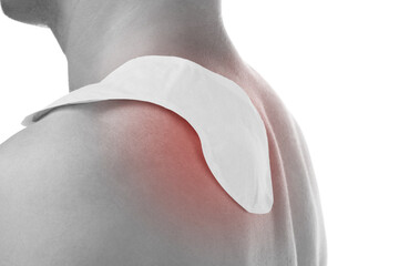 heat patch on mans shoulder.
