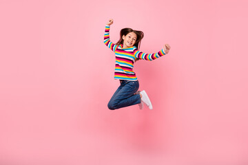 Poster - Photo of funky sportive active lady jump wear striped shirt jeans footwear isolated pink color background