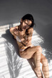 © kalinichenkod - young sports girl in underwear with a beautiful figure posing in the studio.
