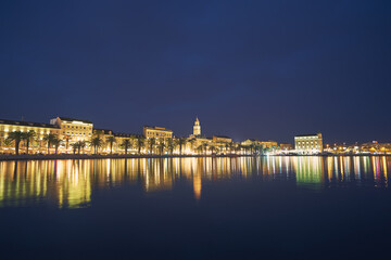 Wall Mural - Travel by Croatia. Beautiful landscape with Split Old Town on sea shore at night.