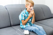 sick child breathes in a nebulizer