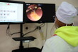 medical student learns laparoscopic surgery on a simulator