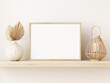 Horizontal wooden frame mockup in neutral beige minimalist Japandi interior with dried palm leaves and wicker lantern on empty warm  white wall  background. Illustration, 3d rendering