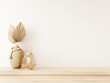 Living room wall mockup in light beige neutral Japandi style interior with dried palm leaves, wicker lantern and wooden beads garland on empty warm white background. 3d rendering, 3d illustration