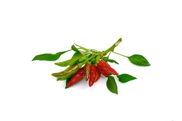 Wall Mural - Red hot chili peppers with green leaves isolated on a white background