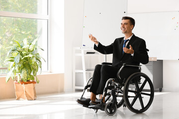 Sticker - Young businessman with physical disability working in office