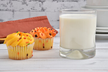 Sticker - Gourmet holiday cupcakes and a glass of milk