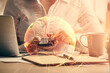 © peshkova - Double exposure of social network sketch hologram and woman holding and using a mobile device.