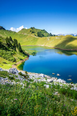 lac de lessy and mountain landscape in the grand-bornand, france