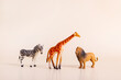 © KatrinaEra - Group of plastic toy animals, Elephant, Tiger, Lion and Cheetah - Miniature plastic toy animals