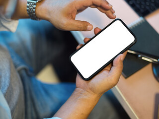 a man using smartphone. texting, message