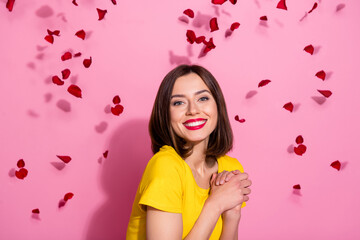 Sticker - Portrait of attractive cute sweet cheerful girl having fun throwing small hearts isolated over pink pastel color background