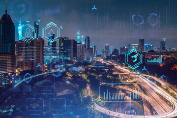 Information flow hologram, night panorama city view of Kuala Lumpur. KL is the largest technological center in Malaysia, Asia. The concept of programming science. Double exposure.