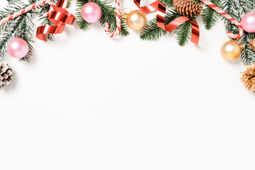 Minimal creative flat lay of christmas traditional composition and new year holiday season. Top view winter christmas decorations on white background with blank space for text. Copy space photography.