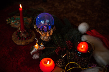 Winter Christmas prediction on a Candle and Tarot cards. Magical esoteric concept. Astrology and wicca rituals