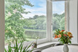 © ADDICTIVE STOCK - Interior of light living room with table near window
