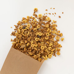 Poster - crunchy granola isolated on white background, top view