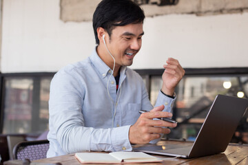 asian man work using computer hand typing laptop keyboard contact us.student study learning education online.adult professional people chatting search at office.concept for technology device business