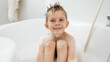 © Kyrylo Ryzhov - Portrait of cute smiling boy enjoying taking bath with soap foam at home