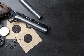 Sticker - Flat lay composition with sport pistol on black table, space for text. Professional gun