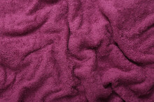 Crumpled Pink Towel Texture. Fabric Background