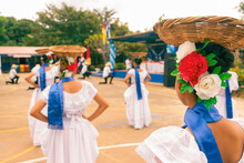 A Group Of Women Wearing The Traditional Costume Of Central America, Nicaragua, Costa Rica, Honduras, El Salvador, Guatemala, Panama And Other Latin American And South America Countries.