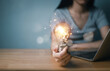thinking and creative concept, Close up the light bulb and working on the desk, Creativity, and innovation are keys to success, new idea and innovation with Brain and light bulbs, copy space for text.