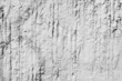 bumpy texture of white concrete wall surface for background or wallpaper