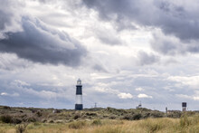 Dramatic Sky And Lighthouse