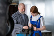 © Westend61 - Mature instructor assisting female apprentice working in workshop