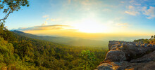 Panoramic View Of Mountains And Cliffs,Tourists Take Beautiful Sunset Photos At The Peak Of Phu Hin Rong Kla National Park And The Rocky Fields On The Hilltops Of Northern Thailand