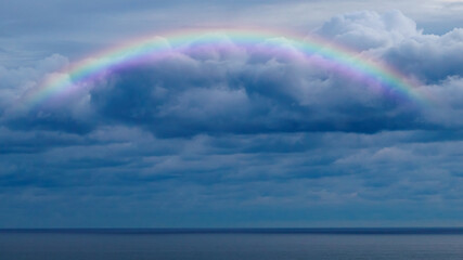 Canvas Print - Beautiful sea with a rainbow in the sky