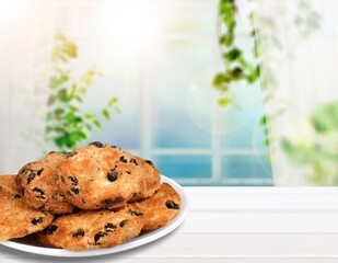 Wall Mural - Heap of tasty sweet chip cookies on a table. Sweet breakfast.