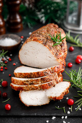 Canvas Print - Christmas turkey ham roasted for festive dinner on black background