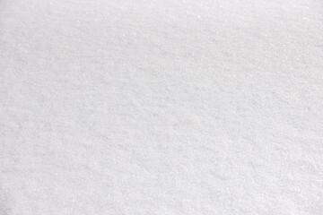 Close up of freshly fallen snow filling the frame.