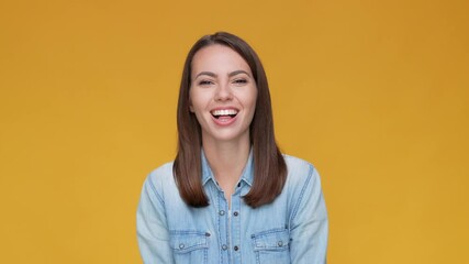 Wall Mural - Positive lady fooling stick tongue isolated brown mustard color background