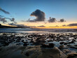 © Cavan Images - Pebble beach with reflects on the water with a amazing sunset in La Pared beach, Fuerteventura.
